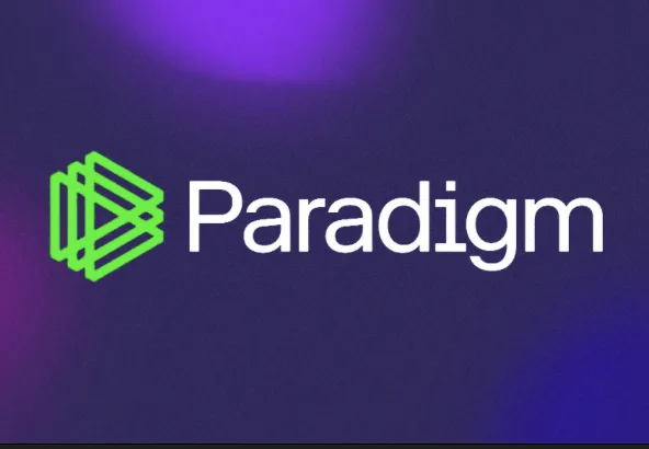 The image shows the Paradigm logo, featuring a green geometric symbol next to the word Paradigm in white text on a dark blue and purple background.